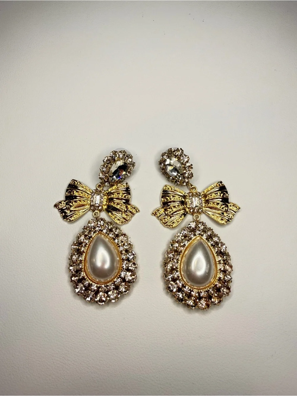 Gold Bow Pearl Drop Earrings with Clear Crystals